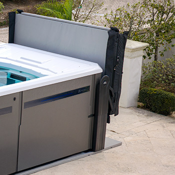 Cover lifter to help lift a swim spa cover.